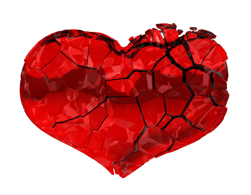 A broken and shattered red heart 